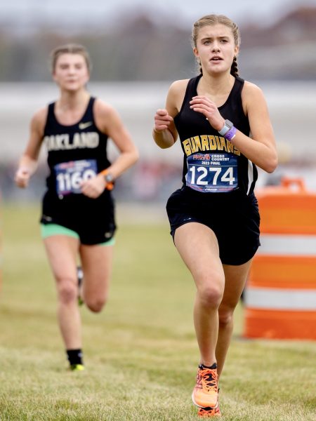 Petoskey St. Michael's Jane Manthei competes in the Division 4 girls race at the MHSAA Cross Country Championships at Michigan International Speedway in Brooklyn on Saturday, Nov. 4, 2023.